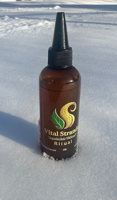 RITUAL Hair Serum. Brown bottle with black cap on a snowy background